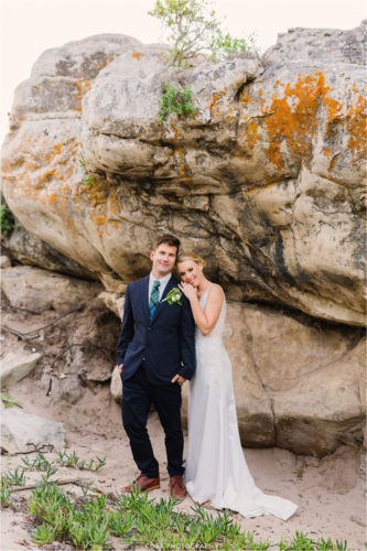couple in front of rock at bosduifklip