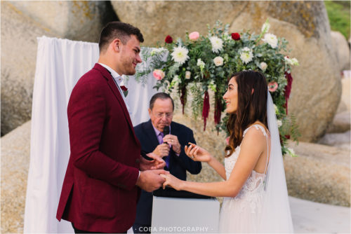 couple exchanging rings at elopement in cape town