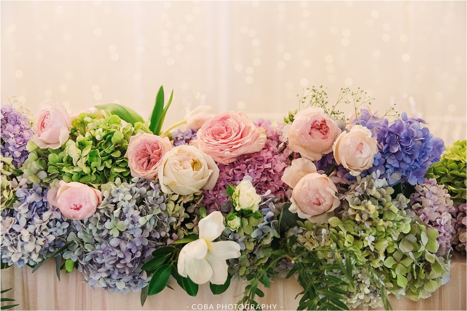 pink and blue wedding flowers at nooitgedacht