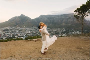 couple embracing after elopement in cape town