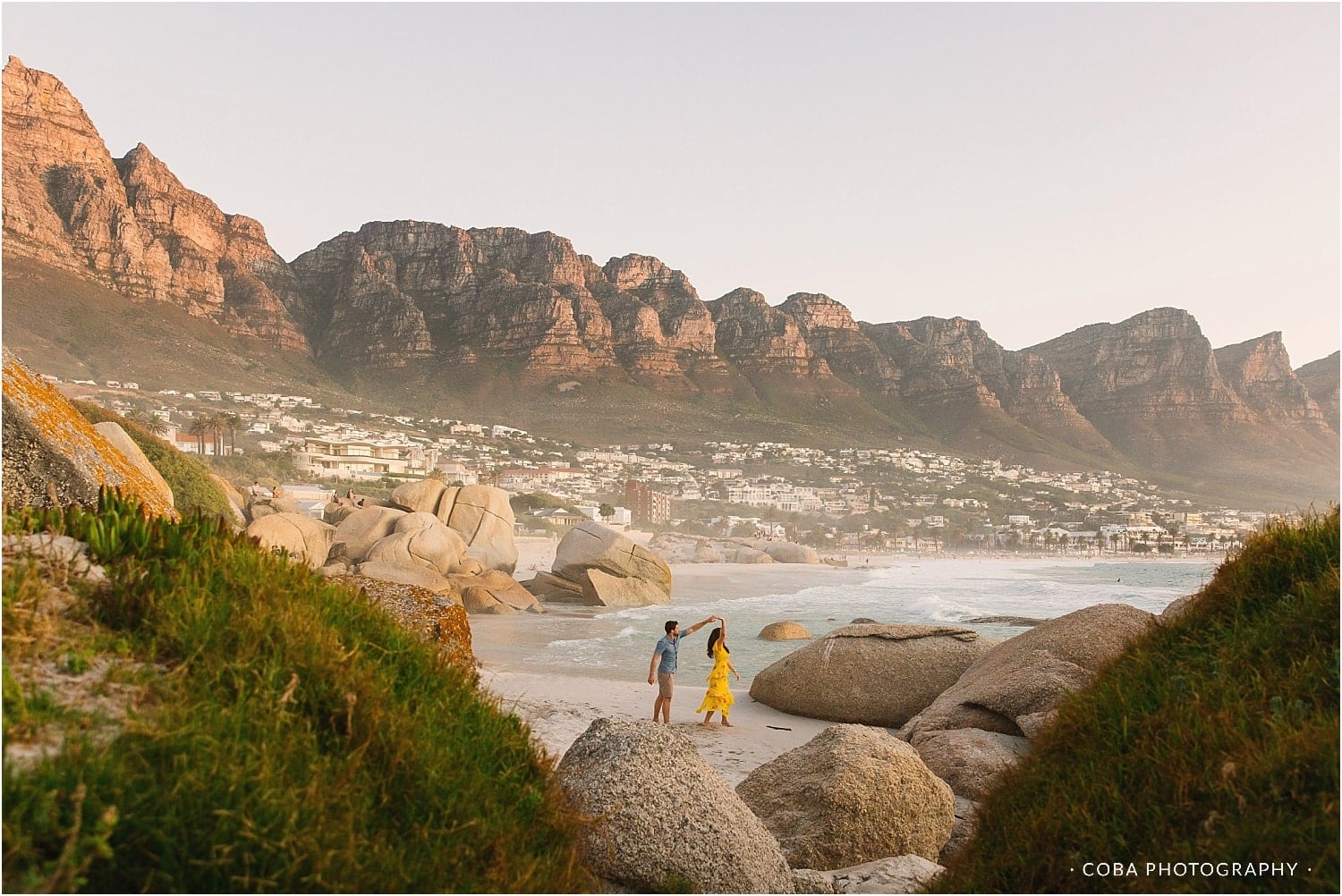 couple shoot photographer cape town - campsbay - coba photography_0158.jpg engagement shoot of couple dancing on beach - cape town