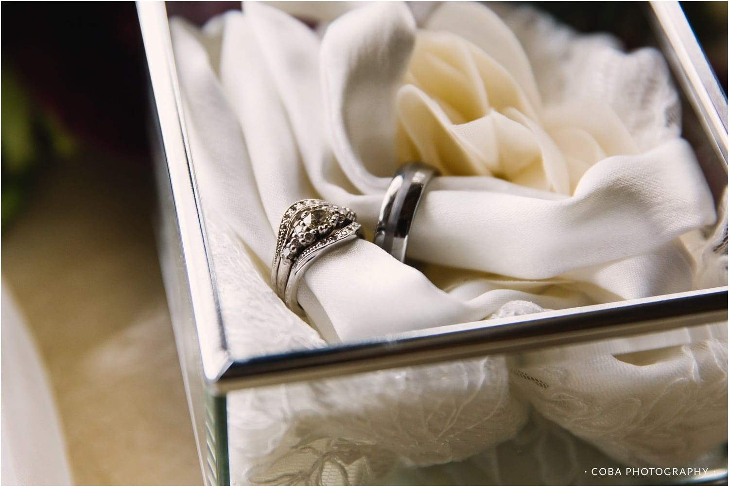 wedding rings in glass box
