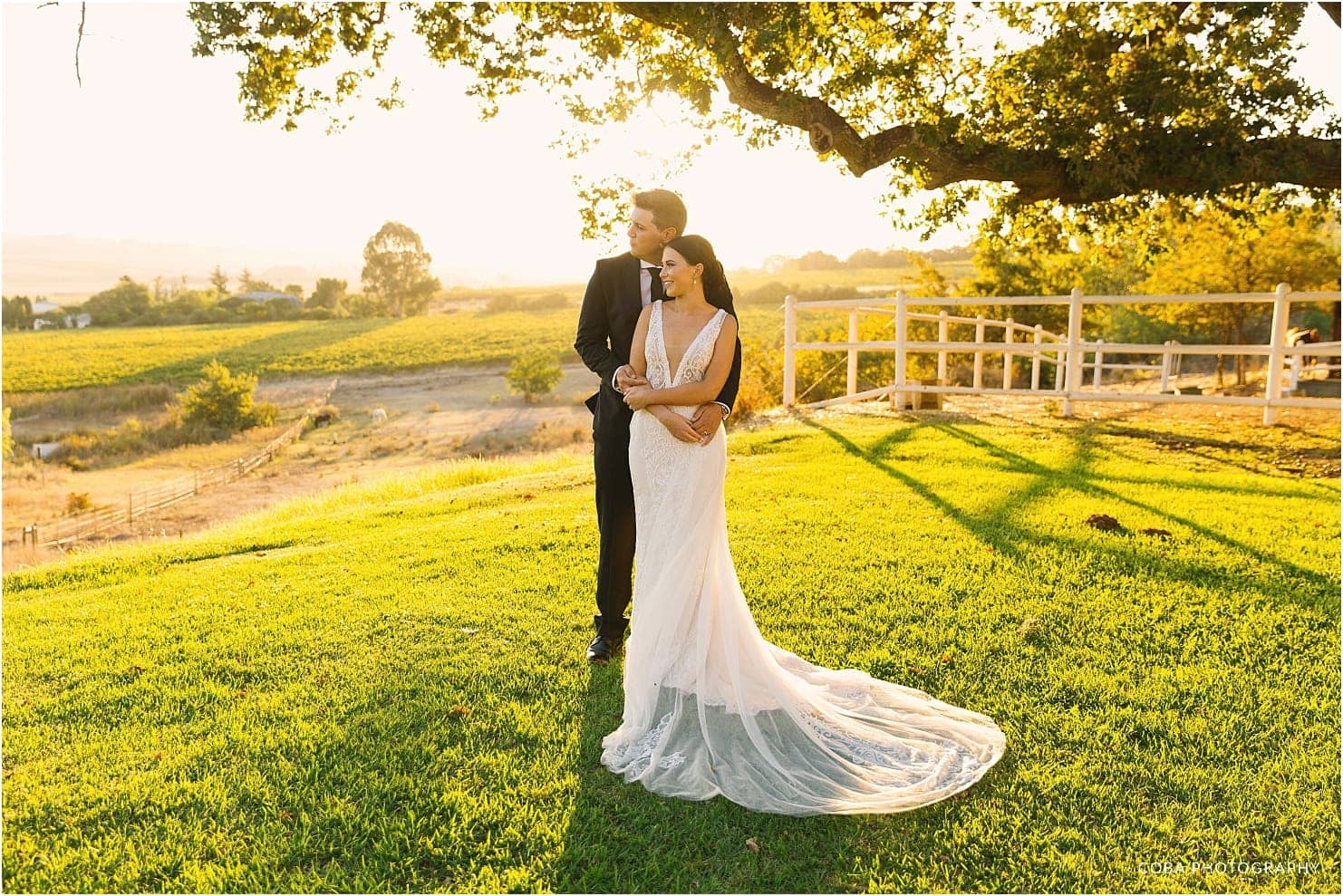 colourful wedding in cape town with couple embracing at diamant estate 
