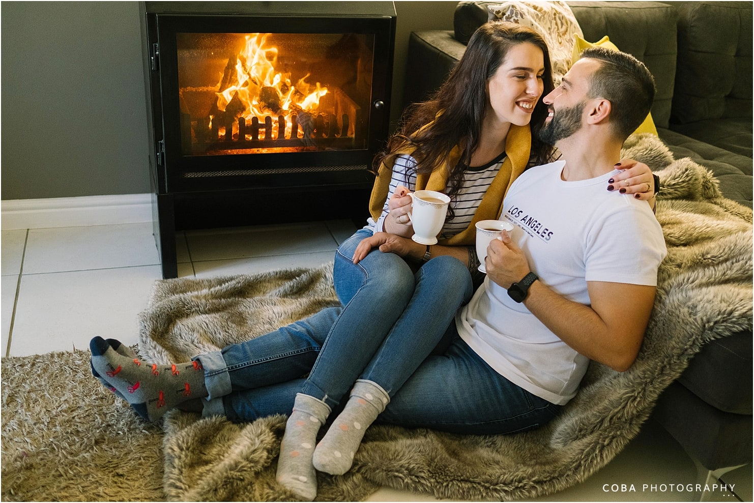 couple in front of fireplace - home photoshoot cape town