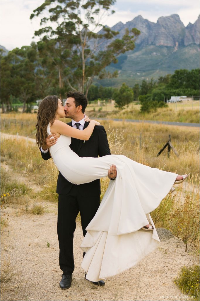 neo venue wedding - bride and groom kissing