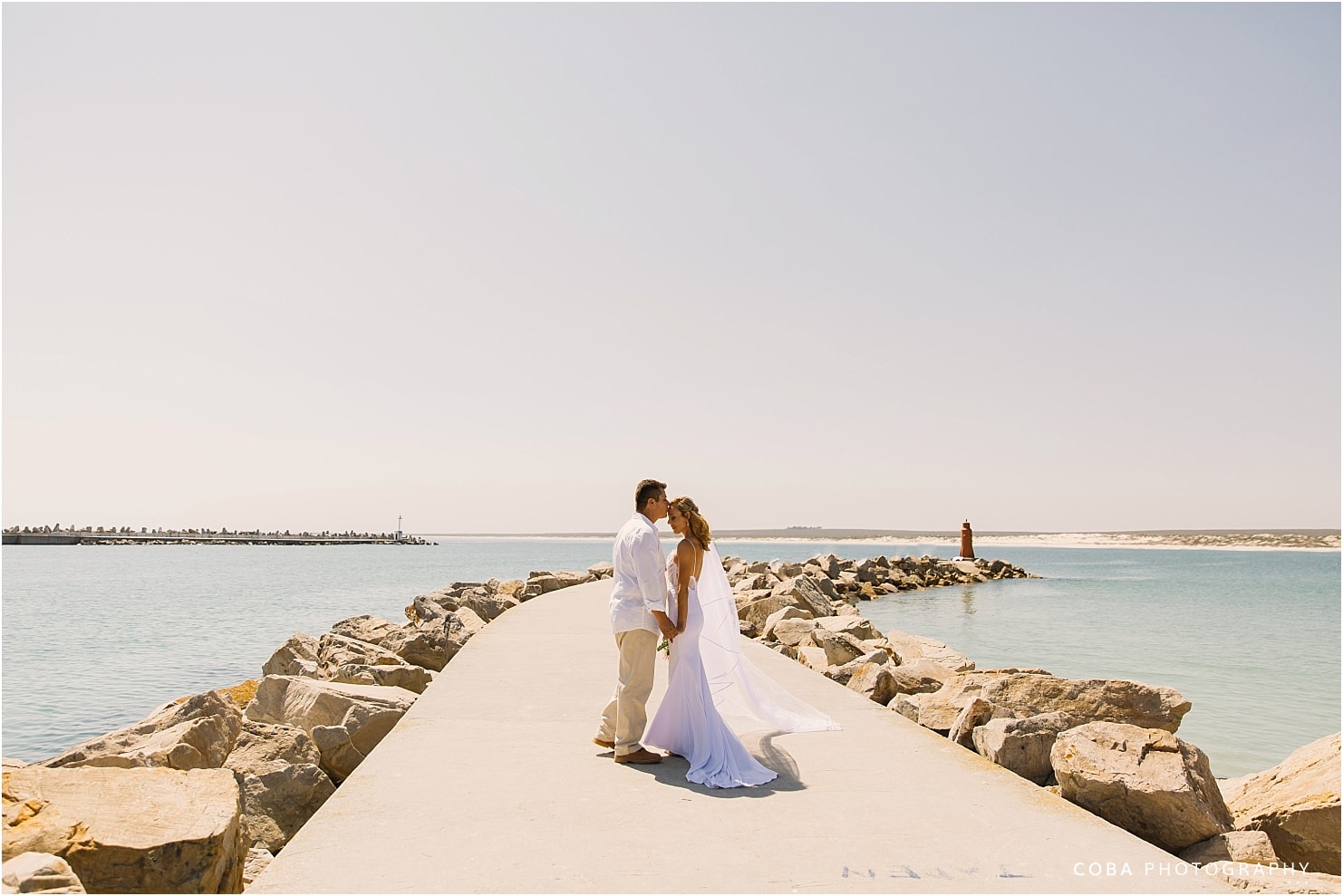 wedding at muisbosskerm lambertsbay - wedding couple at lighthouse