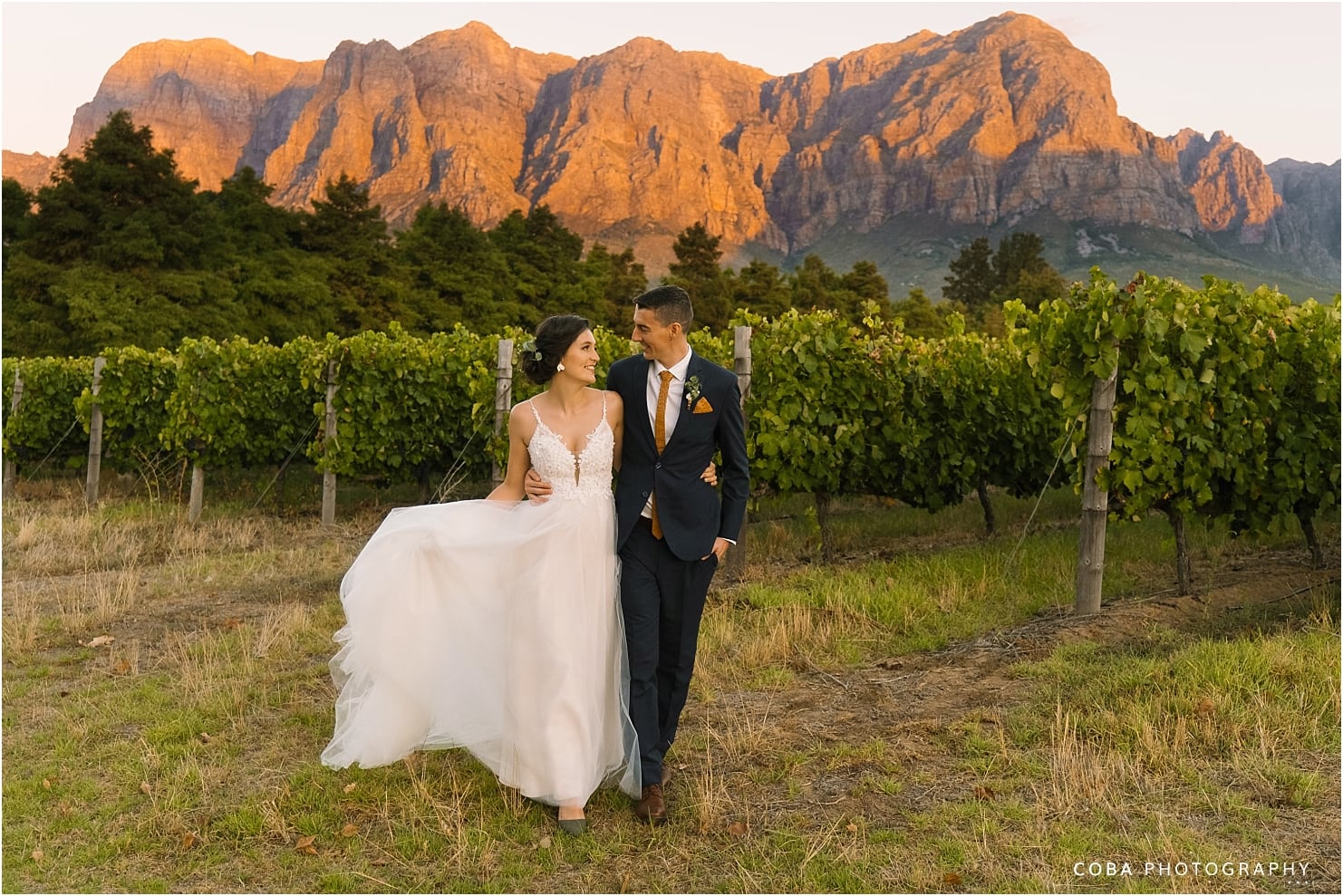 wedding at zorgvliet - couple with mountains in background