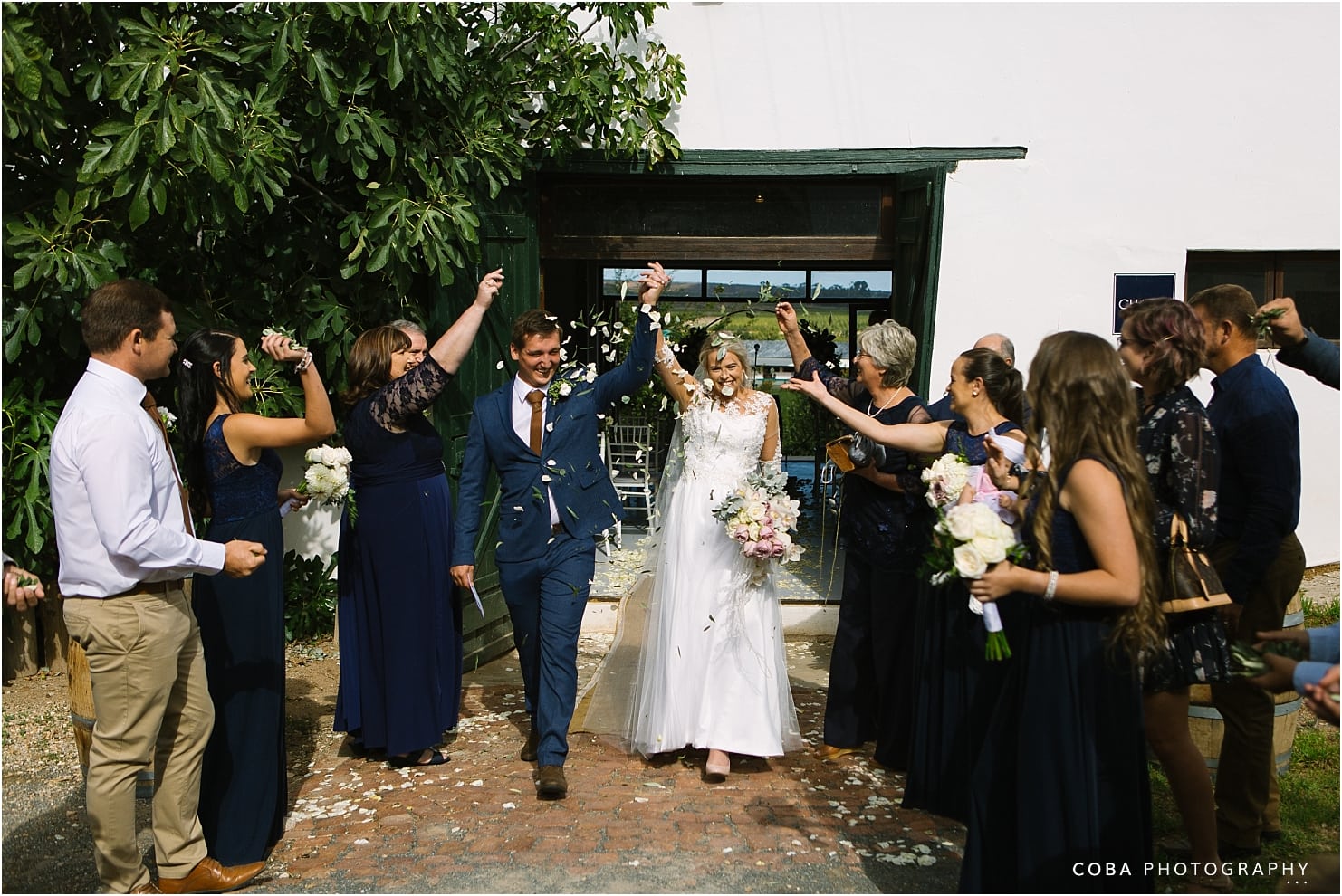 wedding at leipzig worcester couple walking through confetti