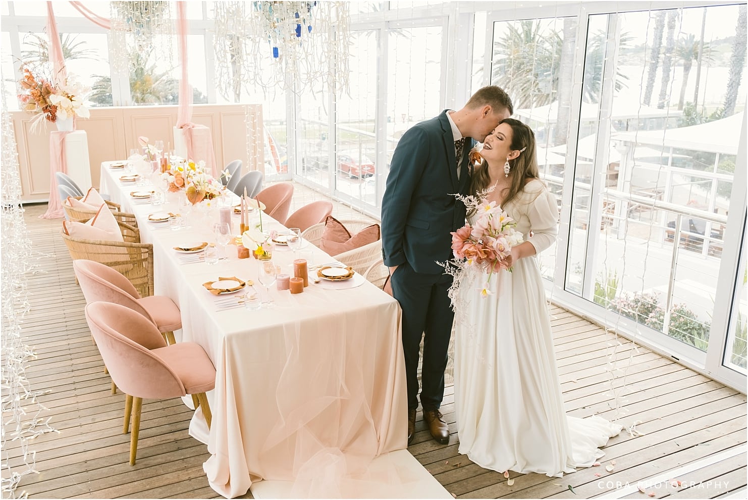 the bay hotel wedding - the table setup with couple