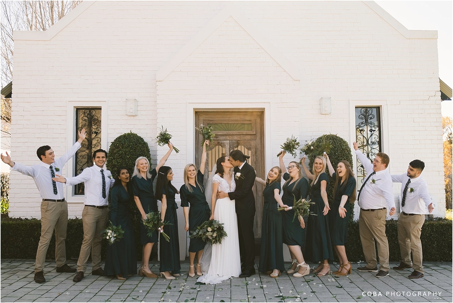 brenaissance wedding - wedding party in front of chapel