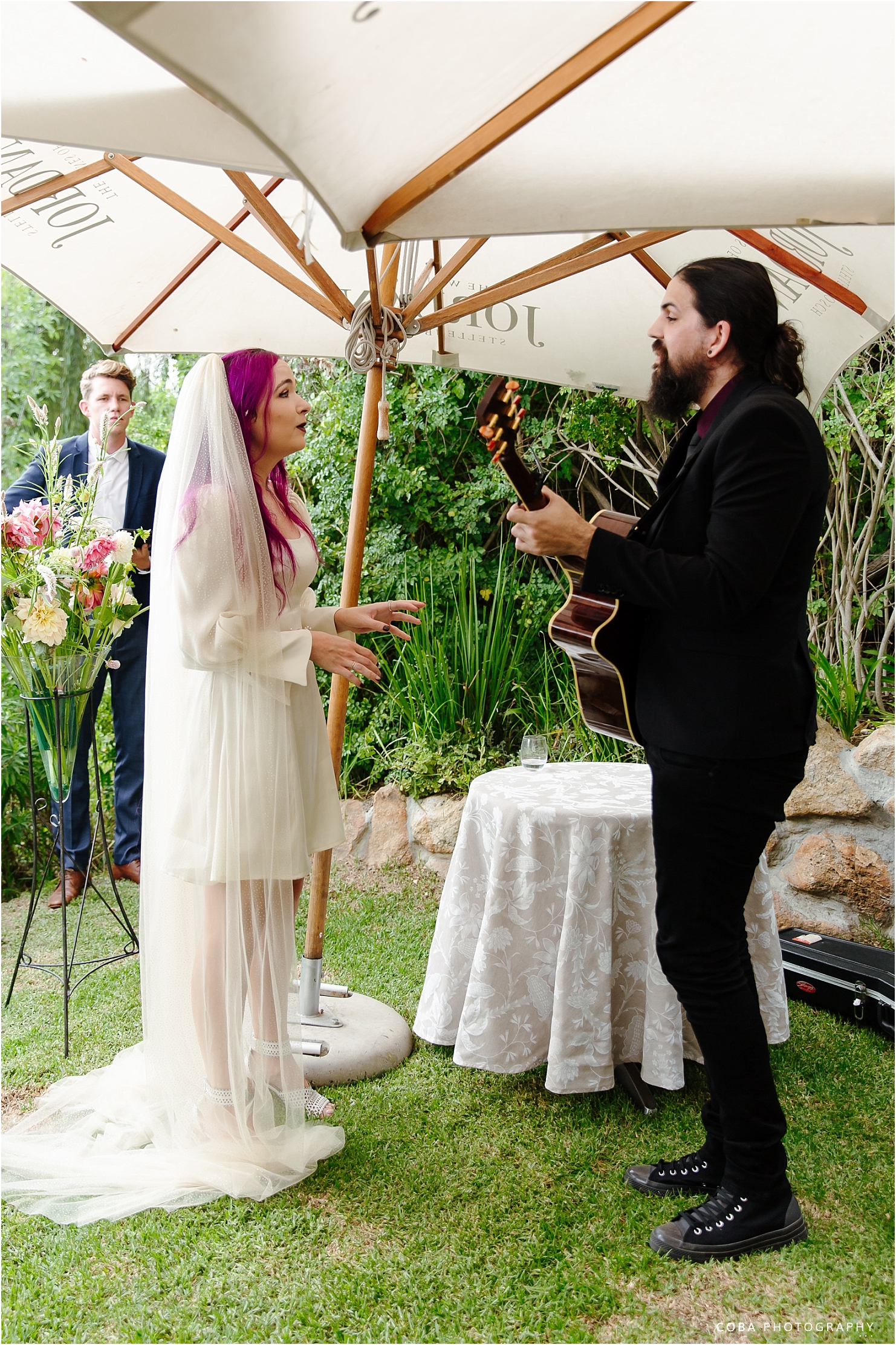 couple sings at wedding - intimate wedding jordan wines