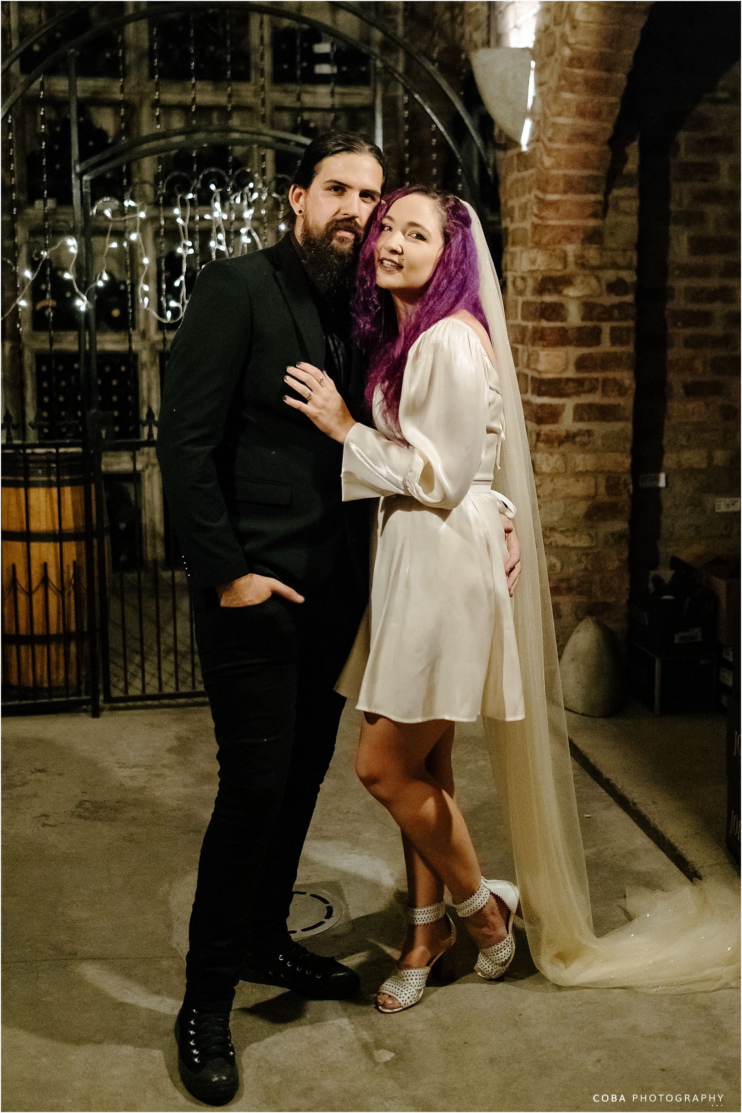 wedding at jordan wine esate - couple in wine cellar