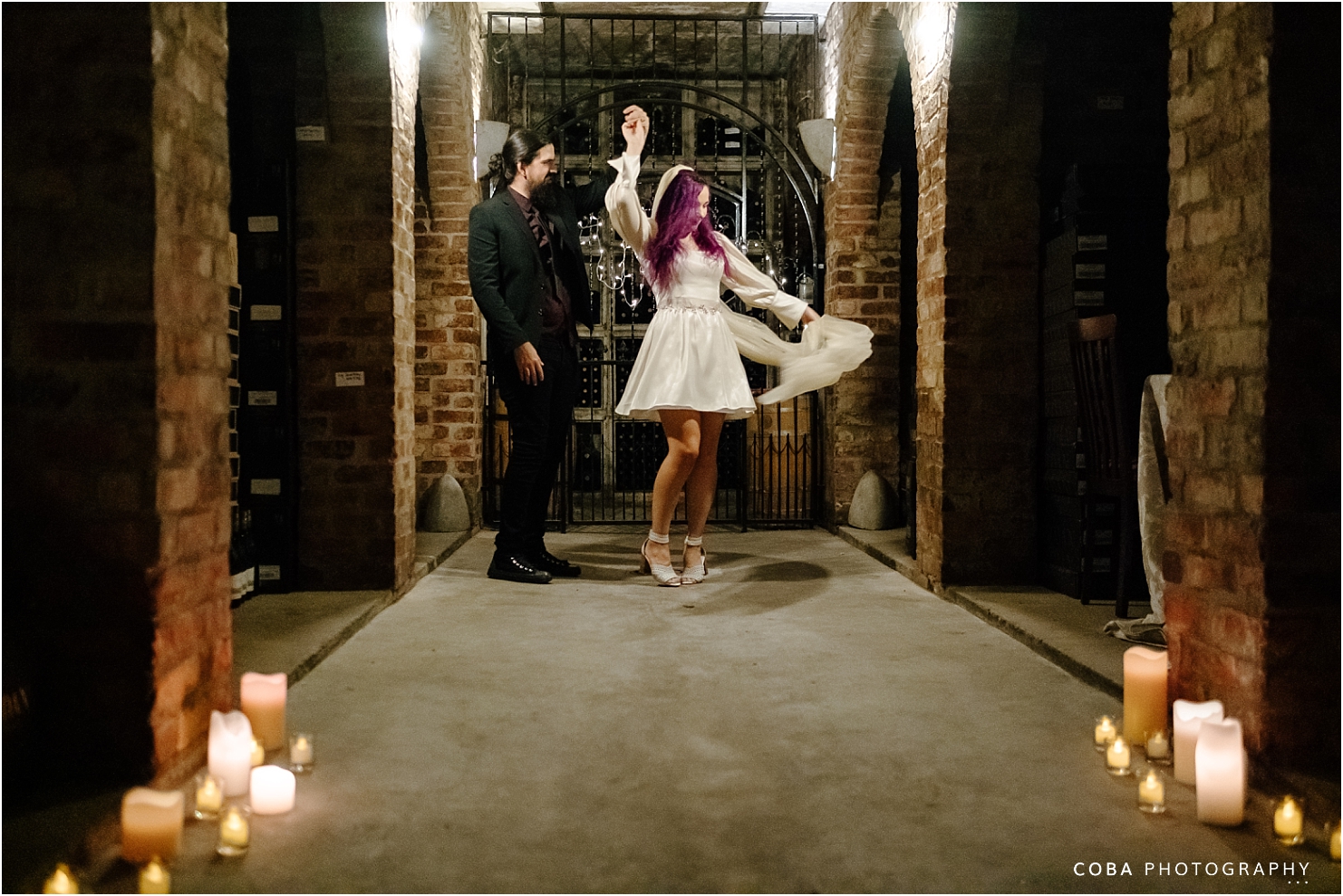 wedding photos in wine cellar - wedding at jordan wine estate