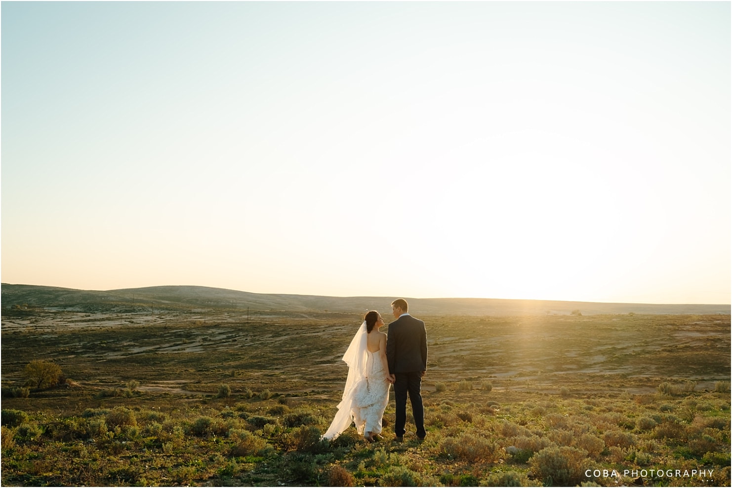 letsatsi lodge wedding vanrhynsdorp - wedding couple photos at sunset