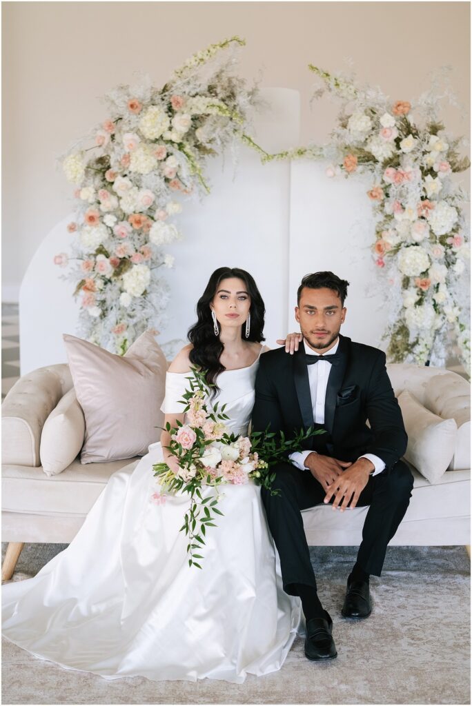 Loch Lynne Wedding Durbanville - bride and groom on couch