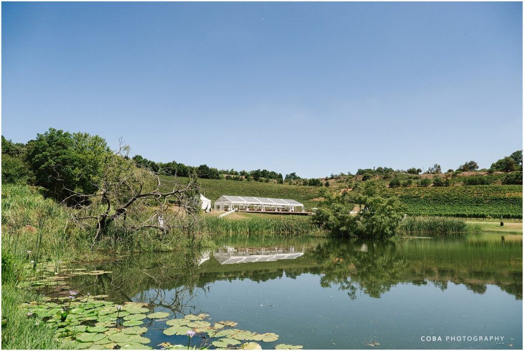 alluvia wedding venue - venue by dam during day time