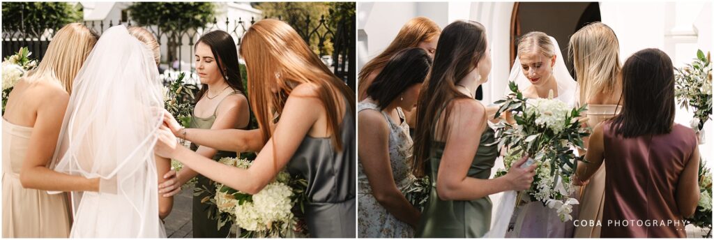 alluvia wedding venue - bridesmaids praying with bride outside stellenbosch moederkerk