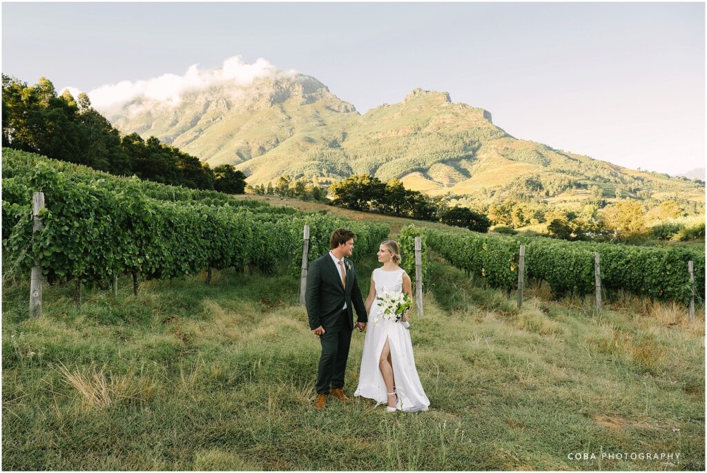 alluvia wedding venue - bride and groom with mountain view