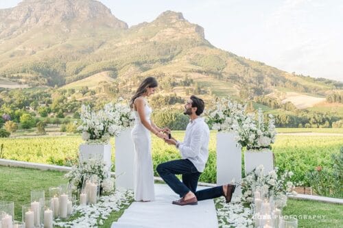 Emotional surprise proposal at Banhoek Lodge captured by Coba Photography as Abhi asks Sangeetha to marry him.