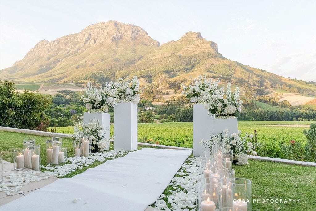 Romantic outdoor proposal decor at Banhoek Lodge styled by Dearest Proposals.