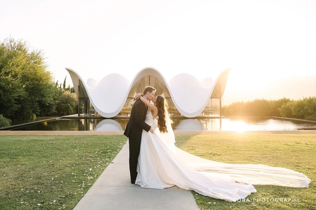 wedding couple infront of kapel at a modern bosjes wedding